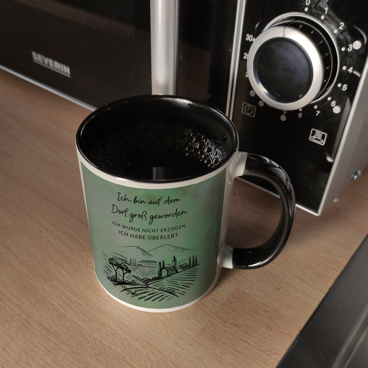 Ich bin auf dem Dorf groß geworden Kaffeebecher mit Spruch