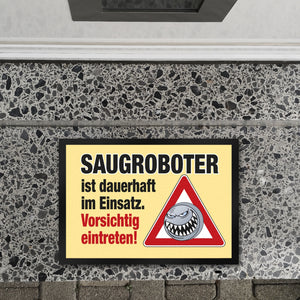 Saugroboter im Einsatz Fußmatte mit Spruch Vorsichtig eintreten!