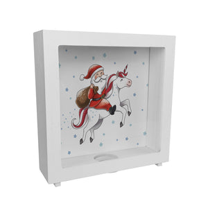 Weihnachtsmann auf Einhorn Spardose