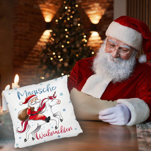Weihnachtsmann auf Einhorn Kissen mit Spruch Magische Weihnachten