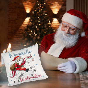 Weihnachtsmann auf Einhorn Kissen mit Spruch Magische Weihnachten