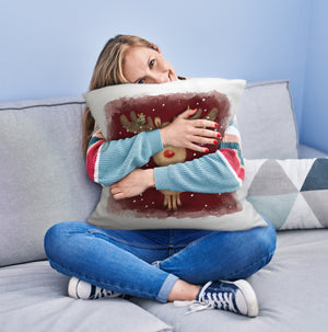 Rentier mit Weihnachtsschmuck Kissen mit rotem Hintergrund