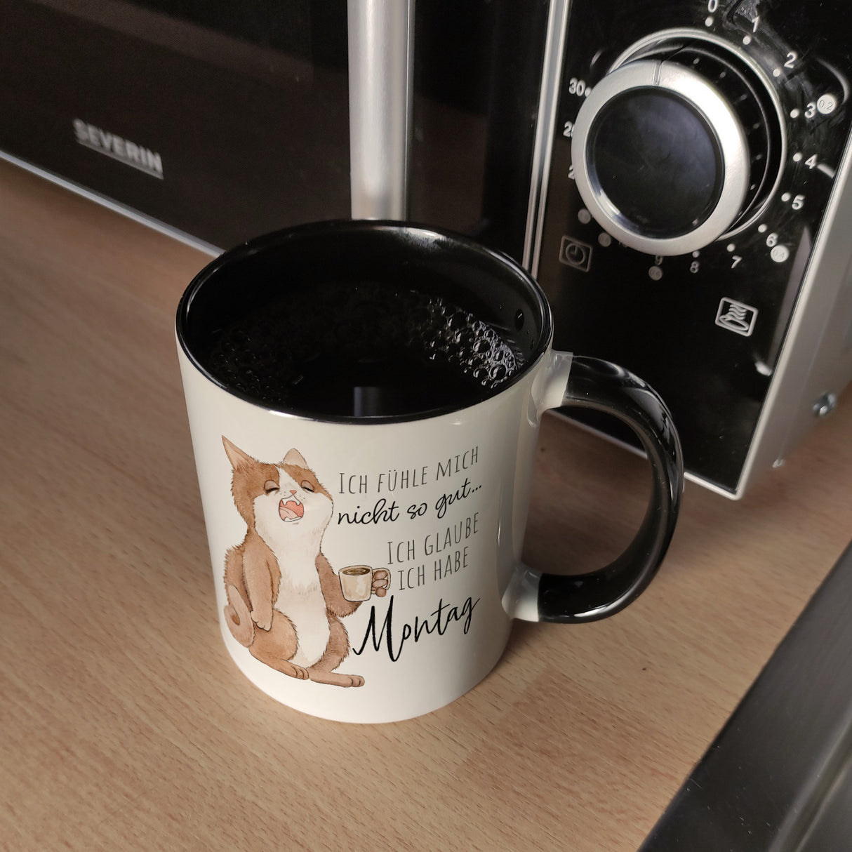 Katze Kaffeebecher mit Spruch Unwohlsein - Verdacht auf Montagsgefühl