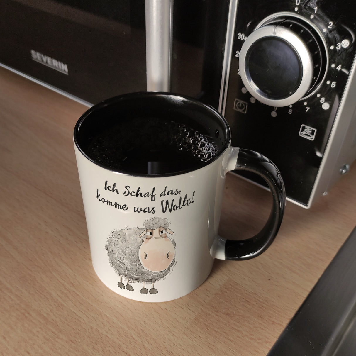 Schaf Kaffeebecher mit Spruch Ich Schaf das komme was Wolle