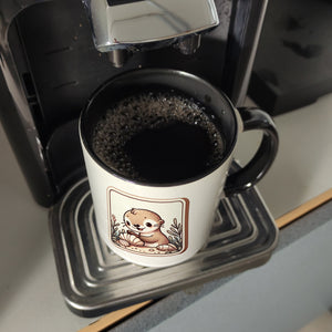 Baby Otter mit Muschel Retro Kaffeebecher