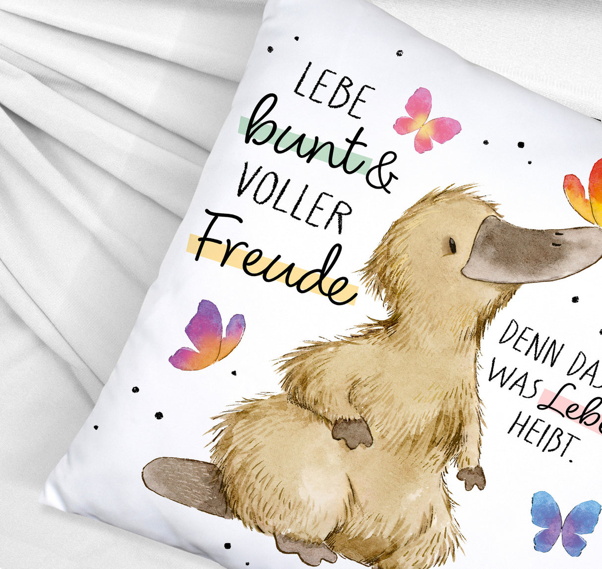 Schnabeltier Kissen mit Spruch Lebe bunt und freudig