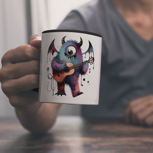 Niedliches Monster mit Gitarre Kaffeebecher