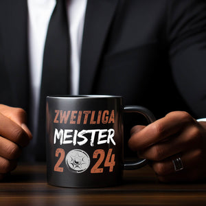 St. Pauli Meisterschale Tasse in Schwarz mit Spruch Zweitliga Meister 2024