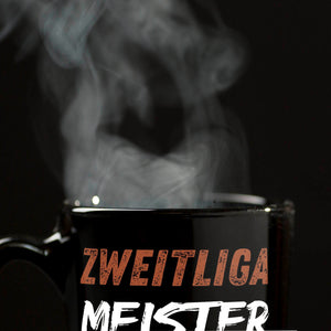 St. Pauli Meisterschale Tasse in Schwarz mit Spruch Zweitliga Meister 2024