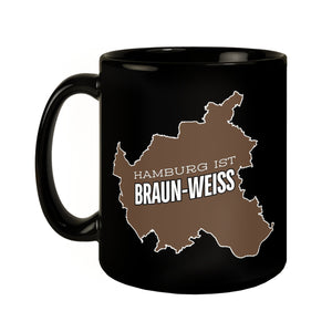 St. Pauli Tasse in Schwarz mit Spruch Hamburg ist braun-weiss