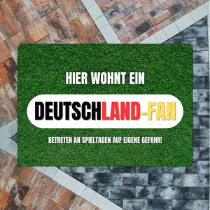 Hier wohnt ein Deutschland-Fan Fußmatte in 35x50 cm ohne Rand mit Spruch Betreten auf eigene Gefahr
