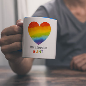 Regenbogenherz Kaffeebecher mit Spruch Im Herzen bunt