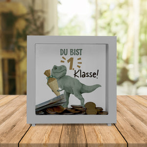 Dino mit Schultüte Spardose mit Spruch Du bist 1. Klasse!