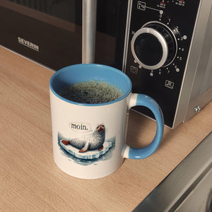 Robbe auf Eisscholle Kaffeebecher mit Spruch Moin