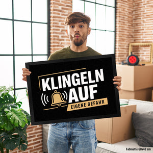 KLINGELN AUF EIGENE GEFAHR Fußmatte in 35x50 cm mit Glockensymbol
