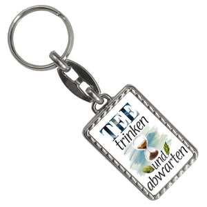 Sanduhr mit Teeblättern Schlüsselanhänger Tee trinken und abwarten