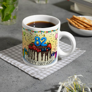 82. Geburtstag Tasse mit Kuchen und Geschenk und Anhänger: zum 29951. Tag