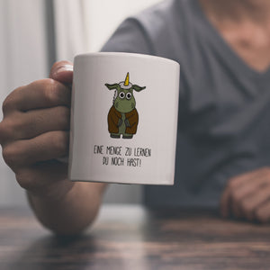 Honeycorns Kaffeebecher mit Einhorn Motiv und Spruch: Eine menge zu lernen du noch hast!