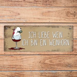 Honeycorns Metallschild mit Einhorn Motiv und Spruch: Ich liebe Wein, ich bin ein Weinhorn