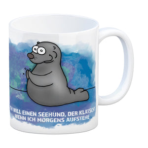 Kaffeebecher mit Seehund Motiv und Spruch: Ich will einen Seehund, der klatscht, ...