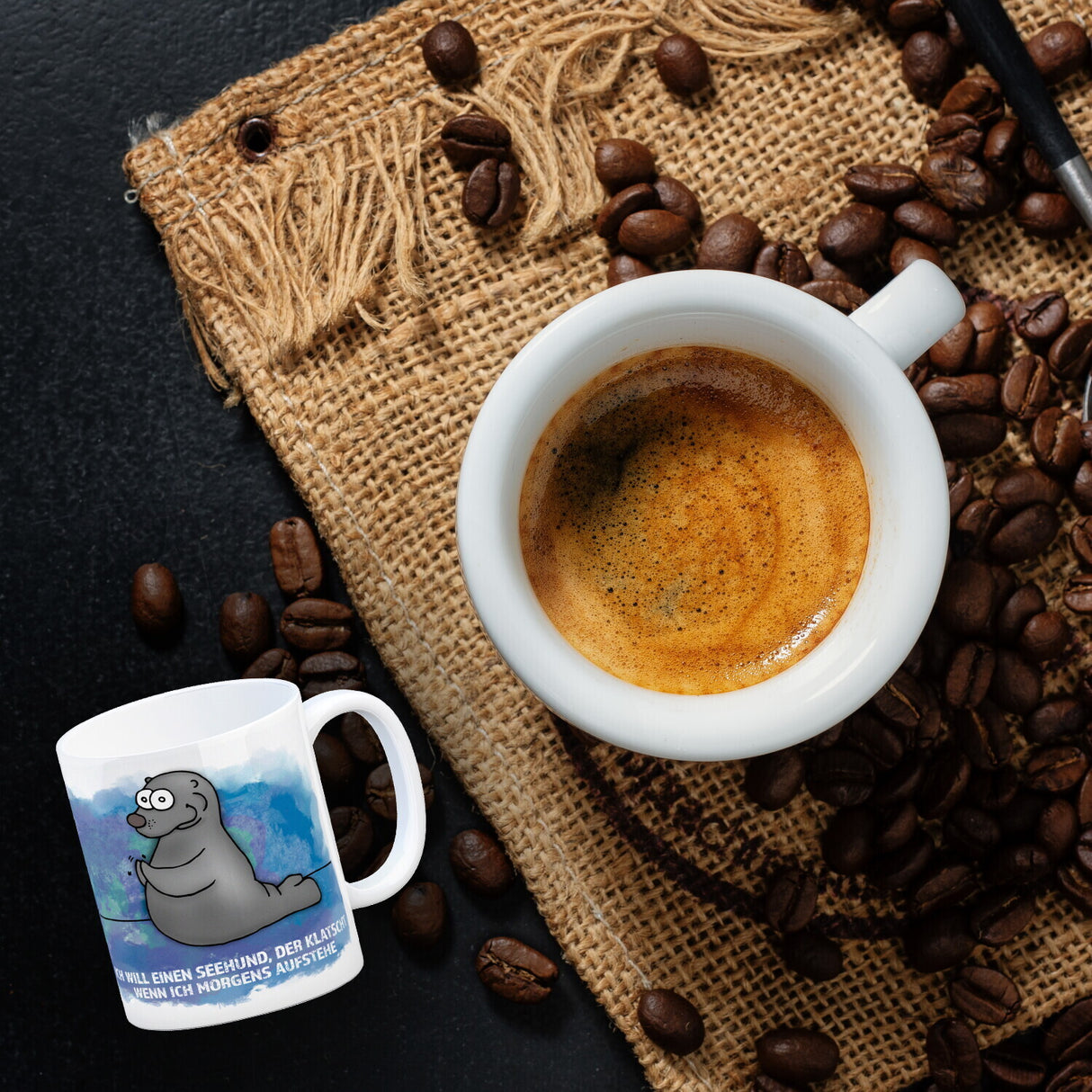 Kaffeebecher mit Seehund Motiv und Spruch: Ich will einen Seehund, der klatscht, ...