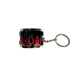 Snare Drum Schlüsselanhänger mit Flammen Motiv
