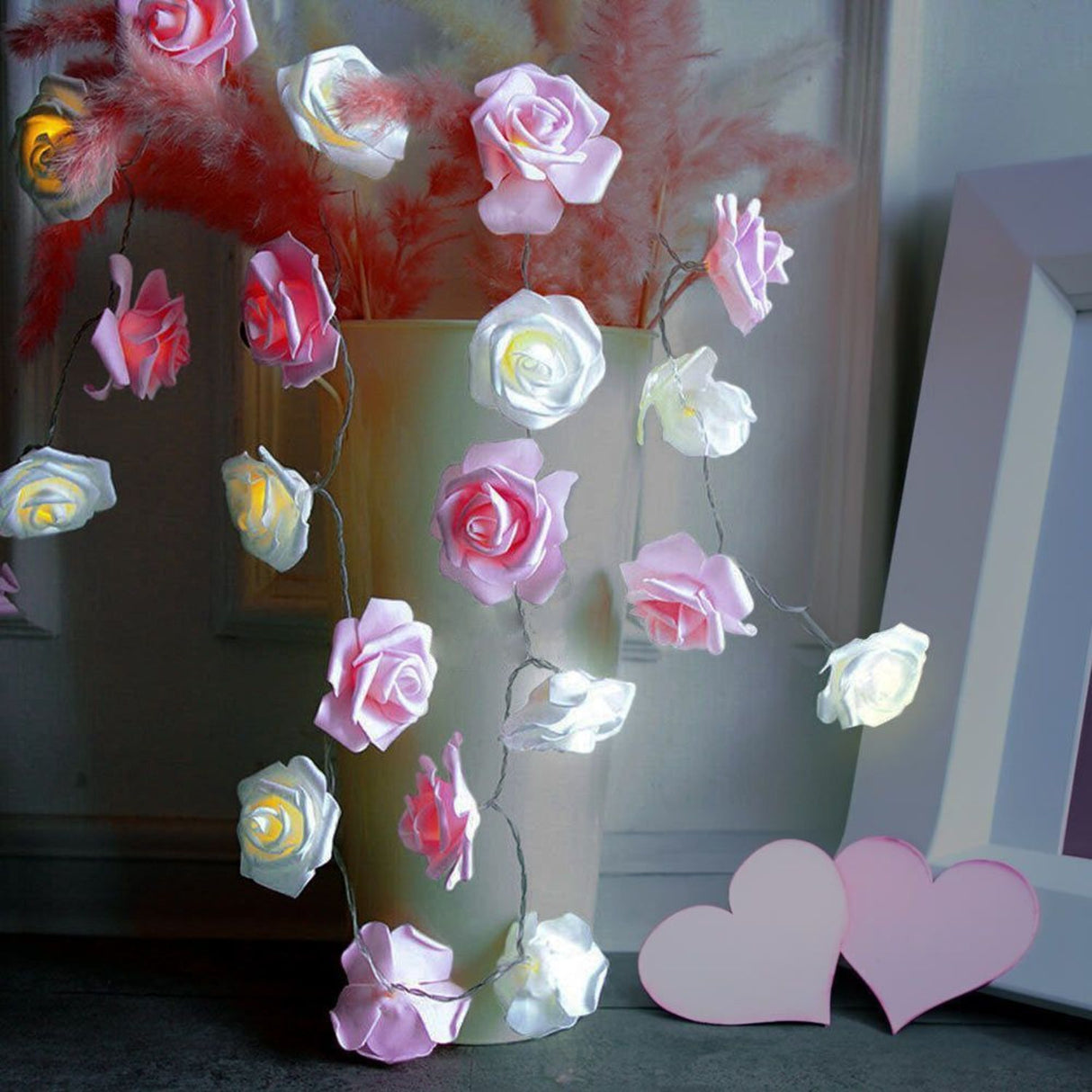 Rosen Lichterkette mit rosa und weißen LED Blüten