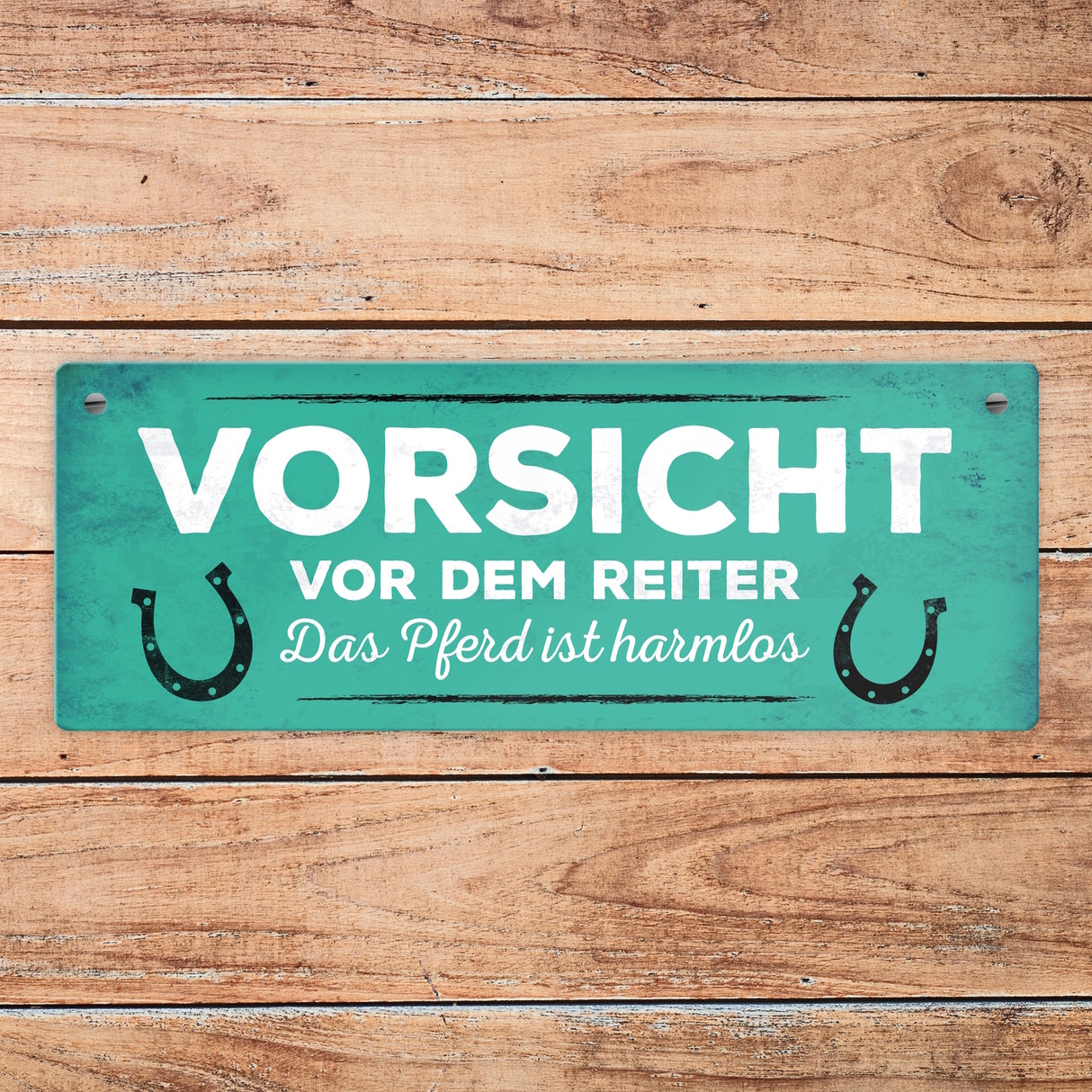 Metallschild mit Spruch: Vorsicht vor dem Reiter, das Pferd ...