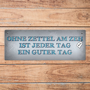 Metallschild mit Spruch: Ohne Zettel am Zeh ist jeder Tag ...