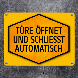 Türe öffnet und schließt automatisch Warn- und Hinweisschild in Gelb und Schwarz