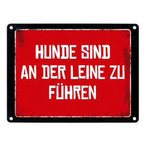 Hunde sind an der Leine zu führen Warn- und Hinweisschild im Used-Look