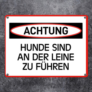Hunde sind an der Leine zu führen Warn- und Hinweisschild im modernen Design