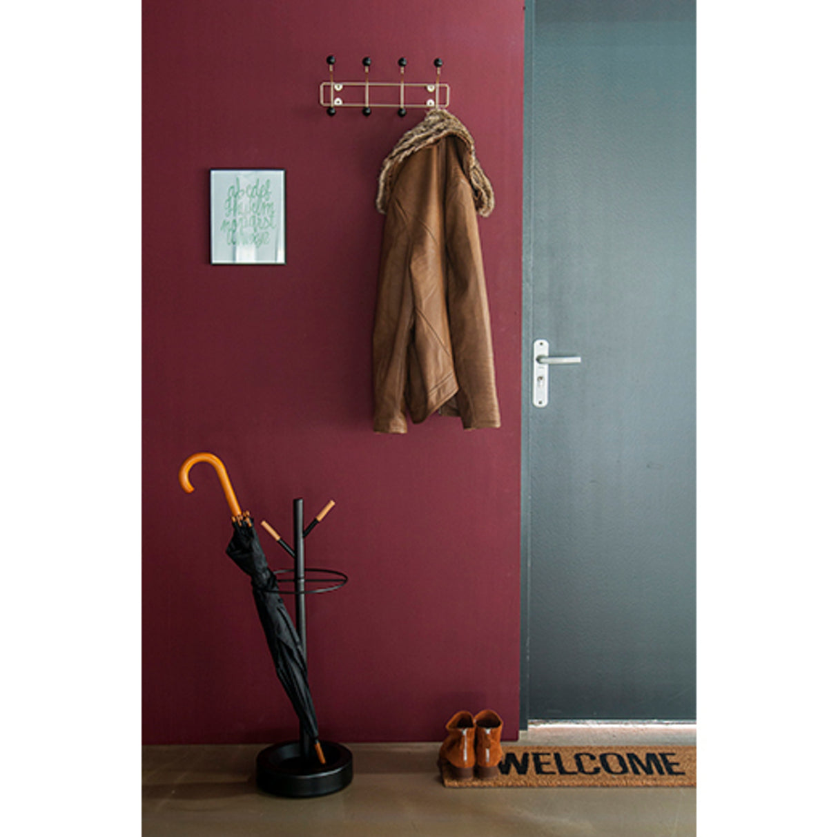Saturnus Garderobe mit 8 Haken in schwarz