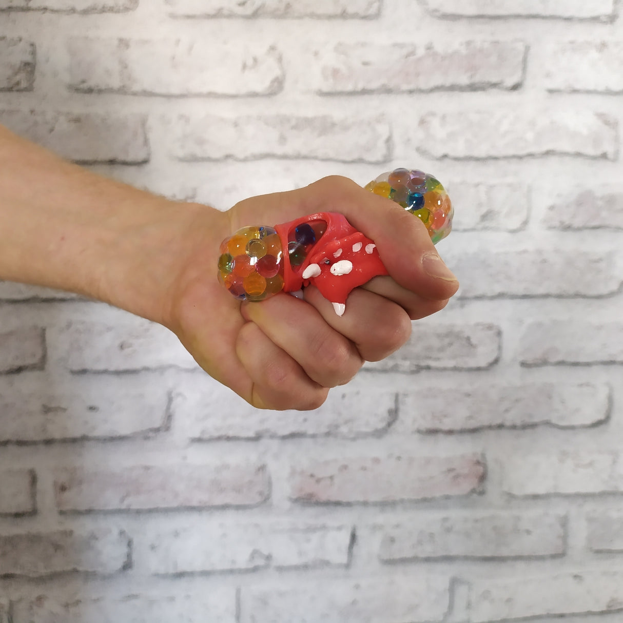 Triceratops Dinosaurier Stressball mit bunten Gel-Kugeln