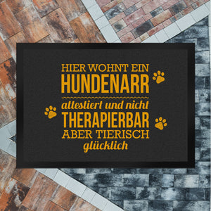 Hier wohnt ein Hundenarr… Fußmatte