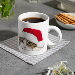 Kaffeebecher mit niedliche Katze und Nikolausmütze