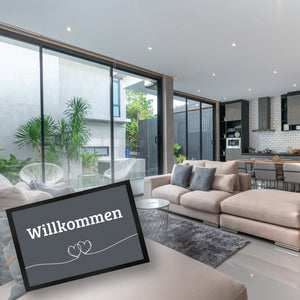 Fußmatte Willkommen in dunkelgrau mit Herzen