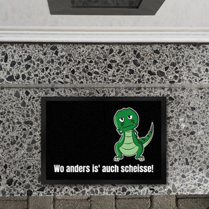 T-Rex Fußmatte in 35x50 cm mit Spruch Wo anders ist es auch scheisse!