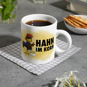 Hahn im Korb - Kaffeebecher mit coolem Cartoon-Hahn