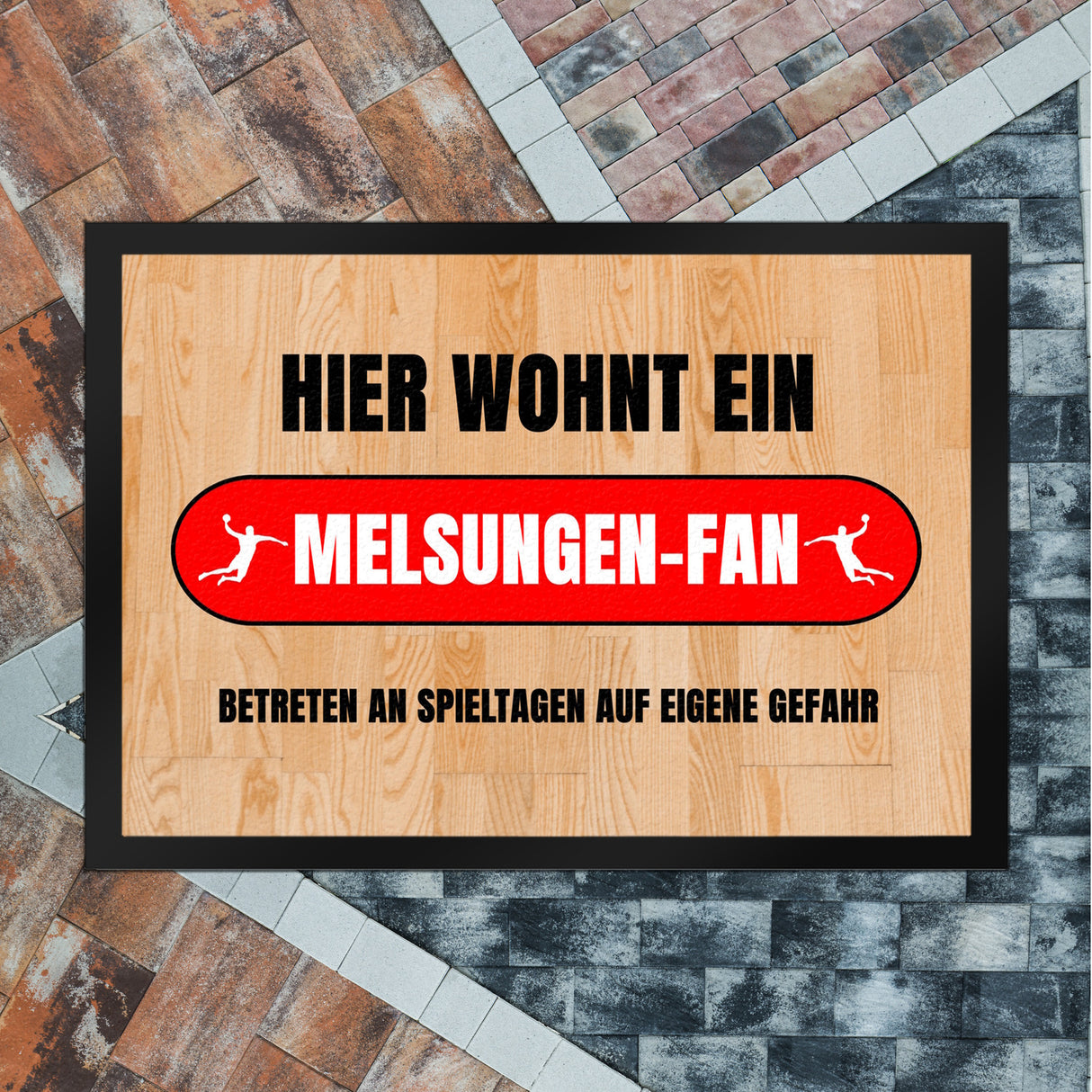 Hier wohnt ein Melsungen-Fan Fußmatte in 35x50 cm mit Turnhallenboden Motiv