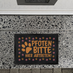 Pfoten bitte hier abtreten Fußmatte mit bunten Fußspuren von Hunden
