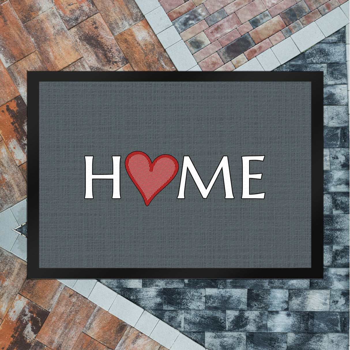 Fußmatte in 35x50 cm in dunkelgrau mit Spruch und Symbol Home und Herz