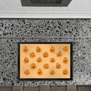 Fußmatte im Halloween Design - mit vielen lustigen geschnitzten Kürbisköpfen