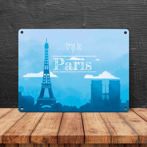 Metallschild in 15x20 cm für Fans von Städtetrips mit der Silhouette von Paris