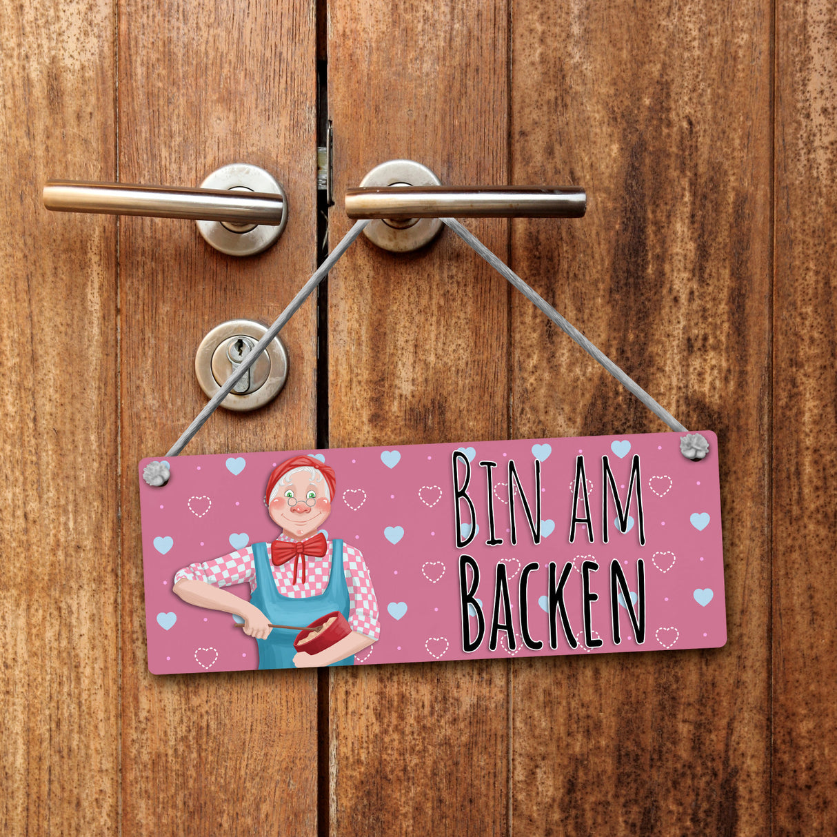 Wendeschild mit Kordel Das perfekte Gadget für alle, die gerne Backen oder viele Plätzchen zur Adventszeit backen. Mit diesem praktischen und schönen Wendeschild kannst du einfach zeigen, dass du gerade in der Küche beschäftigt bist.