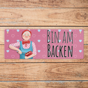 Wendeschild mit Kordel Das perfekte Gadget für alle, die gerne Backen oder viele Plätzchen zur Adventszeit backen. Mit diesem praktischen und schönen Wendeschild kannst du einfach zeigen, dass du gerade in der Küche beschäftigt bist.