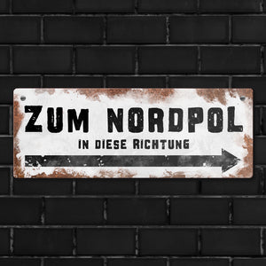 Zum Nordpol in diese Richtung Metallschild im Used-Look