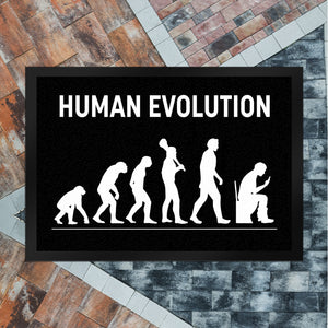 Human Evolution Fußmatte mit witzigem Motiv