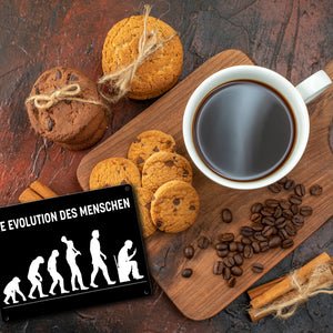 Die Evolution des Menschen Metallschild mit witzigem Motiv für die Toilette