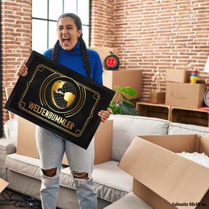 Weltenbummler Fußmatte mit goldenem Globus und Reisemotiv